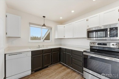 This top-floor 2-bed, 2-bath condo in the Peachtree/Collindale on Collindale Golf Course in Colorado - for sale on GolfHomes.com, golf home, golf lot