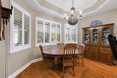 FABULOUS 3/2.5 Bridgeport with HEATED POOL, HOT TUB, and on The Links of Spruce Creek in Florida - for sale on GolfHomes.com, golf home, golf lot