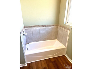 POSSIBLE OWNER FINANCING!  Beautifully Updated Home in the on Tiger Point Golf and Country Club in Florida - for sale on GolfHomes.com, golf home, golf lot