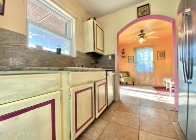 This charming solid brick home sits on a coveted 0.30-acre on Randolph Park Golf Courses in Arizona - for sale on GolfHomes.com, golf home, golf lot