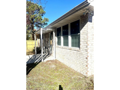 POSSIBLE OWNER FINANCING!  Beautifully Updated Home in the on Tiger Point Golf and Country Club in Florida - for sale on GolfHomes.com, golf home, golf lot
