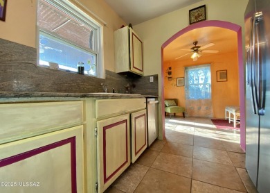 This charming solid brick home sits on a coveted 0.30-acre on Randolph Park Golf Courses in Arizona - for sale on GolfHomes.com, golf home, golf lot