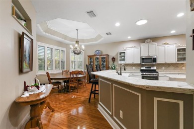 FABULOUS 3/2.5 Bridgeport with HEATED POOL, HOT TUB, and on The Links of Spruce Creek in Florida - for sale on GolfHomes.com, golf home, golf lot