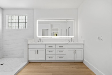 Beautifully updated & recently renovated home in the highly on PGA National Golf Club in Florida - for sale on GolfHomes.com, golf home, golf lot