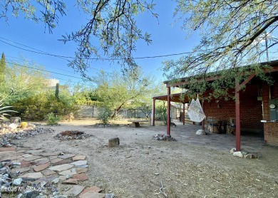 This charming solid brick home sits on a coveted 0.30-acre on Randolph Park Golf Courses in Arizona - for sale on GolfHomes.com, golf home, golf lot