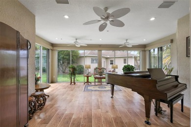 FABULOUS 3/2.5 Bridgeport with HEATED POOL, HOT TUB, and on The Links of Spruce Creek in Florida - for sale on GolfHomes.com, golf home, golf lot
