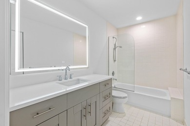 Beautifully updated & recently renovated home in the highly on PGA National Golf Club in Florida - for sale on GolfHomes.com, golf home, golf lot