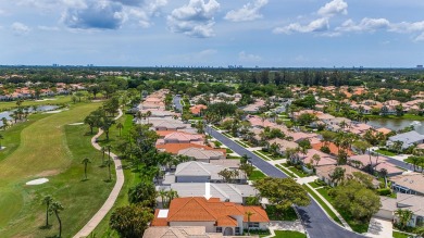 Beautifully updated & recently renovated home in the highly on PGA National Golf Club in Florida - for sale on GolfHomes.com, golf home, golf lot