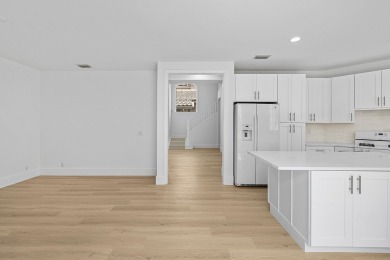 Beautifully updated & recently renovated home in the highly on PGA National Golf Club in Florida - for sale on GolfHomes.com, golf home, golf lot