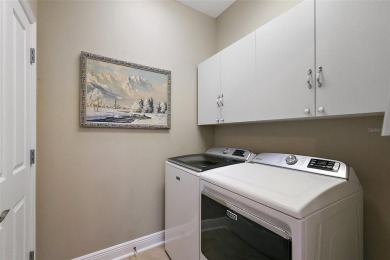 FABULOUS 3/2.5 Bridgeport with HEATED POOL, HOT TUB, and on The Links of Spruce Creek in Florida - for sale on GolfHomes.com, golf home, golf lot
