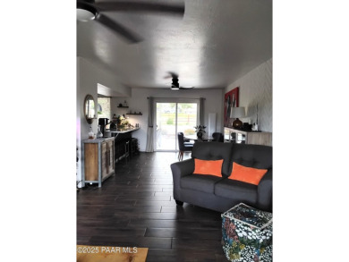 Inviting single-level golf course home with mountain views! on Prescott Golf and Country Club in Arizona - for sale on GolfHomes.com, golf home, golf lot