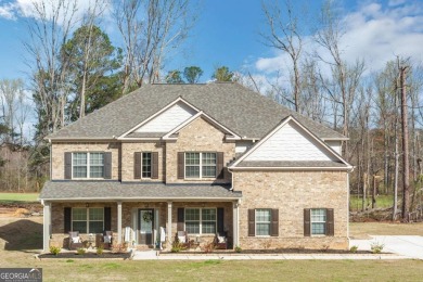 Set on a large golf course lot, this 5 bedroom, 4 bath home on The Club at Shoal Creek Golf Course in Georgia - for sale on GolfHomes.com, golf home, golf lot