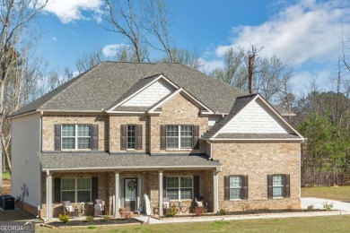 Set on a large golf course lot, this 5 bedroom, 4 bath home on The Club at Shoal Creek Golf Course in Georgia - for sale on GolfHomes.com, golf home, golf lot
