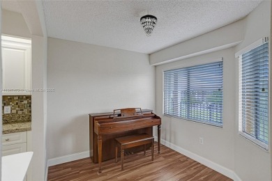 This substantially remodeled 2 bedroom with 2 baths is located on Flamingo Lakes Country Club in Florida - for sale on GolfHomes.com, golf home, golf lot