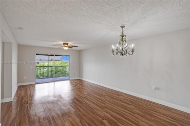 This substantially remodeled 2 bedroom with 2 baths is located on Flamingo Lakes Country Club in Florida - for sale on GolfHomes.com, golf home, golf lot