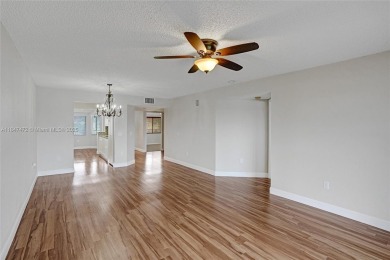 This substantially remodeled 2 bedroom with 2 baths is located on Flamingo Lakes Country Club in Florida - for sale on GolfHomes.com, golf home, golf lot