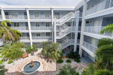 LUXURY LIVING IN A GATED COMPLEX WITHIN PGI! Move-in ready, 2 on Saint Andrews South Golf Club in Florida - for sale on GolfHomes.com, golf home, golf lot
