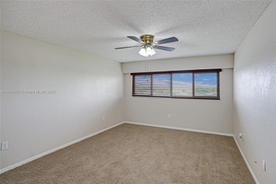 This substantially remodeled 2 bedroom with 2 baths is located on Flamingo Lakes Country Club in Florida - for sale on GolfHomes.com, golf home, golf lot