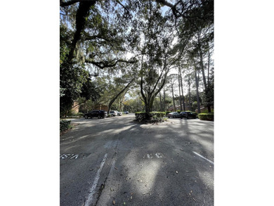 Swing into your updated style sanctuary at 6 Masters Court--a on Palm Harbor Golf Club in Florida - for sale on GolfHomes.com, golf home, golf lot