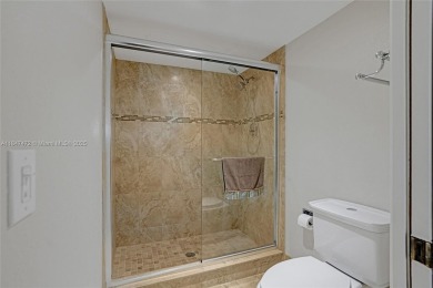 This substantially remodeled 2 bedroom with 2 baths is located on Flamingo Lakes Country Club in Florida - for sale on GolfHomes.com, golf home, golf lot