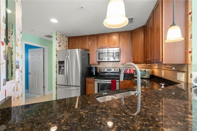 LUXURY LIVING IN A GATED COMPLEX WITHIN PGI! Move-in ready, 2 on Saint Andrews South Golf Club in Florida - for sale on GolfHomes.com, golf home, golf lot