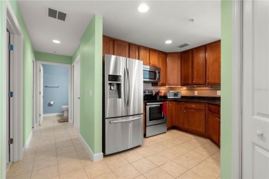 LUXURY LIVING IN A GATED COMPLEX WITHIN PGI! Move-in ready, 2 on Saint Andrews South Golf Club in Florida - for sale on GolfHomes.com, golf home, golf lot