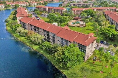 This substantially remodeled 2 bedroom with 2 baths is located on Flamingo Lakes Country Club in Florida - for sale on GolfHomes.com, golf home, golf lot