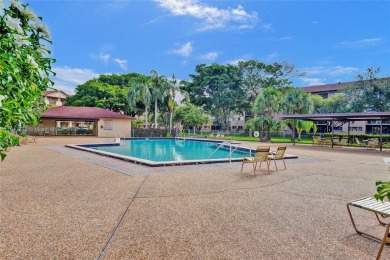 This substantially remodeled 2 bedroom with 2 baths is located on Flamingo Lakes Country Club in Florida - for sale on GolfHomes.com, golf home, golf lot