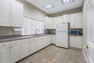 LUXURY LIVING IN A GATED COMPLEX WITHIN PGI! Move-in ready, 2 on Saint Andrews South Golf Club in Florida - for sale on GolfHomes.com, golf home, golf lot