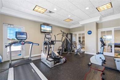LUXURY LIVING IN A GATED COMPLEX WITHIN PGI! Move-in ready, 2 on Saint Andrews South Golf Club in Florida - for sale on GolfHomes.com, golf home, golf lot