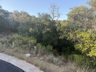 Gently sloping lot in the heart of Horseshoe Bay Proper. Build on Slick Rock Golf Course - Horseshoe Bay in Texas - for sale on GolfHomes.com, golf home, golf lot