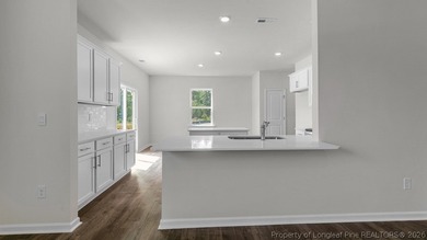 Welcome to 3093 Platinum Circle at Gretchen Pines located in on Seven Lakes Country Club in North Carolina - for sale on GolfHomes.com, golf home, golf lot