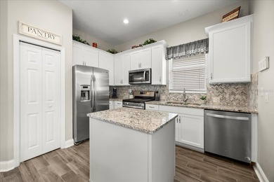 This beautiful renovated 3 bed 2.5 bath single level ranch home on Reunion Resort Golf Course in Florida - for sale on GolfHomes.com, golf home, golf lot