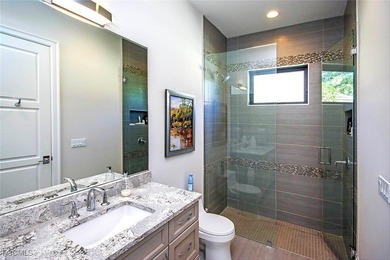 This Sanctuary home is ideally located on desirable Baltusrol Ct on The Sanctuary Golf Club in Florida - for sale on GolfHomes.com, golf home, golf lot