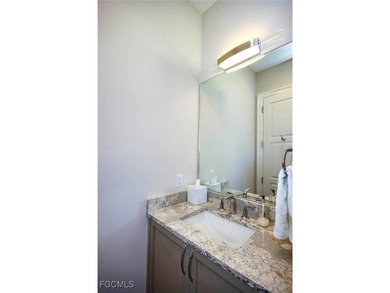 This Sanctuary home is ideally located on desirable Baltusrol Ct on The Sanctuary Golf Club in Florida - for sale on GolfHomes.com, golf home, golf lot