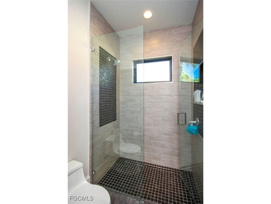 This Sanctuary home is ideally located on desirable Baltusrol Ct on The Sanctuary Golf Club in Florida - for sale on GolfHomes.com, golf home, golf lot