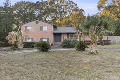 Welcome to 8755 Scenic Hills Dr -- a spacious and beautifully on Scenic Hills Country Club in Florida - for sale on GolfHomes.com, golf home, golf lot