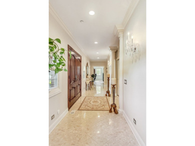 This freshly and professionally landscaped Mediterranean Mansion on Park Ridge Country Club in Illinois - for sale on GolfHomes.com, golf home, golf lot