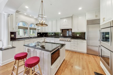 This freshly and professionally landscaped Mediterranean Mansion on Park Ridge Country Club in Illinois - for sale on GolfHomes.com, golf home, golf lot