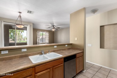 Your sweet condo home,  or home away from home,  awaits your on Royal Palms Golf Course in Arizona - for sale on GolfHomes.com, golf home, golf lot