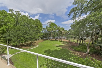 This Lowcountry Estate sits on a park-like private lot with on Dunes West Golf Club in South Carolina - for sale on GolfHomes.com, golf home, golf lot