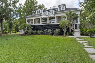 This Lowcountry Estate sits on a park-like private lot with on Dunes West Golf Club in South Carolina - for sale on GolfHomes.com, golf home, golf lot
