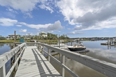 This Lowcountry Estate sits on a park-like private lot with on Dunes West Golf Club in South Carolina - for sale on GolfHomes.com, golf home, golf lot