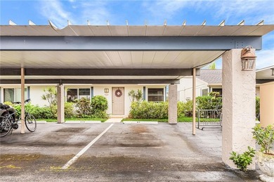 Welcome home to paradise in this fabulous main-level condo on Royal Palm Golf Club in Florida - for sale on GolfHomes.com, golf home, golf lot