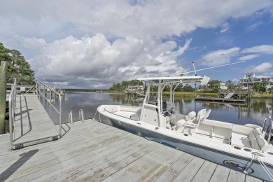 This Lowcountry Estate sits on a park-like private lot with on Dunes West Golf Club in South Carolina - for sale on GolfHomes.com, golf home, golf lot