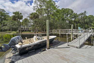 This Lowcountry Estate sits on a park-like private lot with on Dunes West Golf Club in South Carolina - for sale on GolfHomes.com, golf home, golf lot