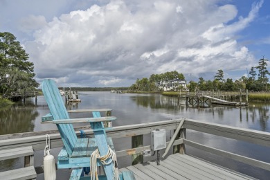 This Lowcountry Estate sits on a park-like private lot with on Dunes West Golf Club in South Carolina - for sale on GolfHomes.com, golf home, golf lot