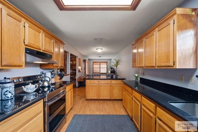 Welcome to this beautifully maintained 5-bedroom, 3-bath home on Brownsville Golf Center in Texas - for sale on GolfHomes.com, golf home, golf lot