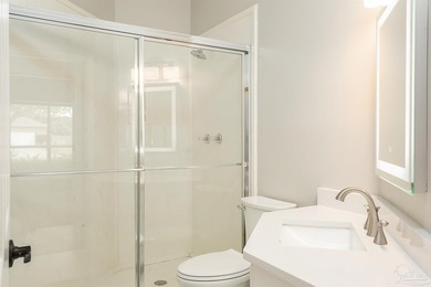 Beautifully renovated 4 bedroom, 3 full bath home on the 13th on Tiger Point Golf and Country Club in Florida - for sale on GolfHomes.com, golf home, golf lot