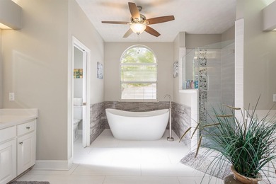 Beautifully renovated 4 bedroom, 3 full bath home on the 13th on Tiger Point Golf and Country Club in Florida - for sale on GolfHomes.com, golf home, golf lot